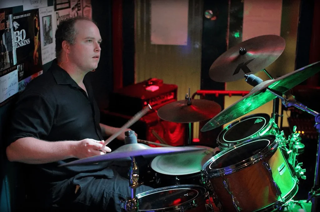 Daniel Jason Booth playing drums on a Yamaha 9000 Recording Custom kit